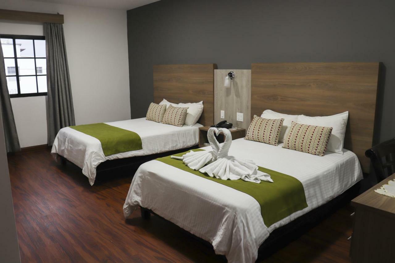 Hotel Puerta Del Sol David Bagian luar foto